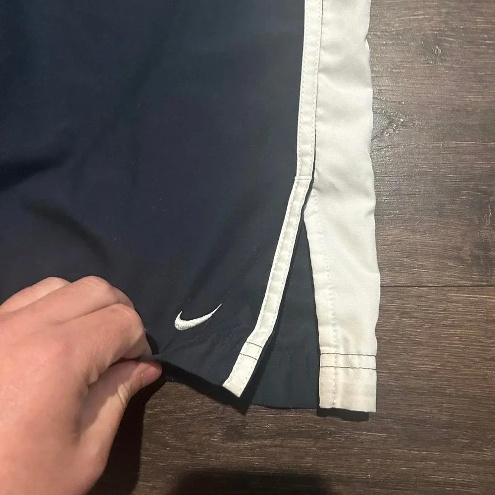Y2K women's Nike grey tag navy blue and white baggy flare track pants Size M